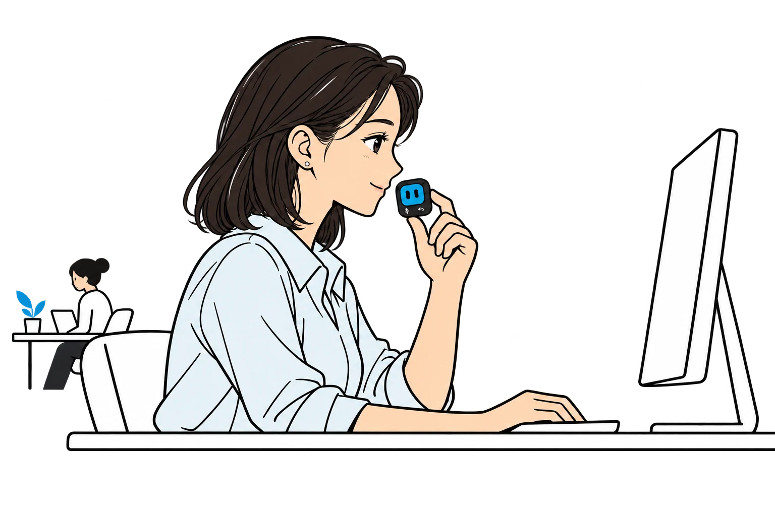 An office worker speaks softly into a small handheld device, with a computer farther away on the desk.